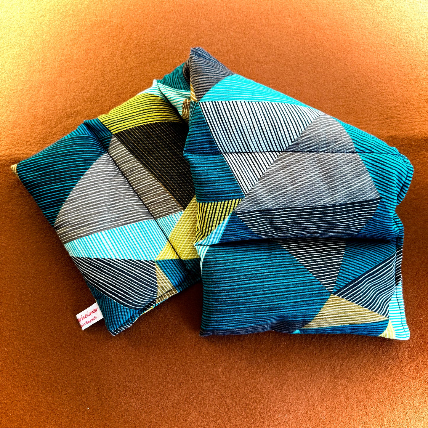 "Wärmender Willi" mit Dinkelkorn - Einzelstück Grafisch Petrol