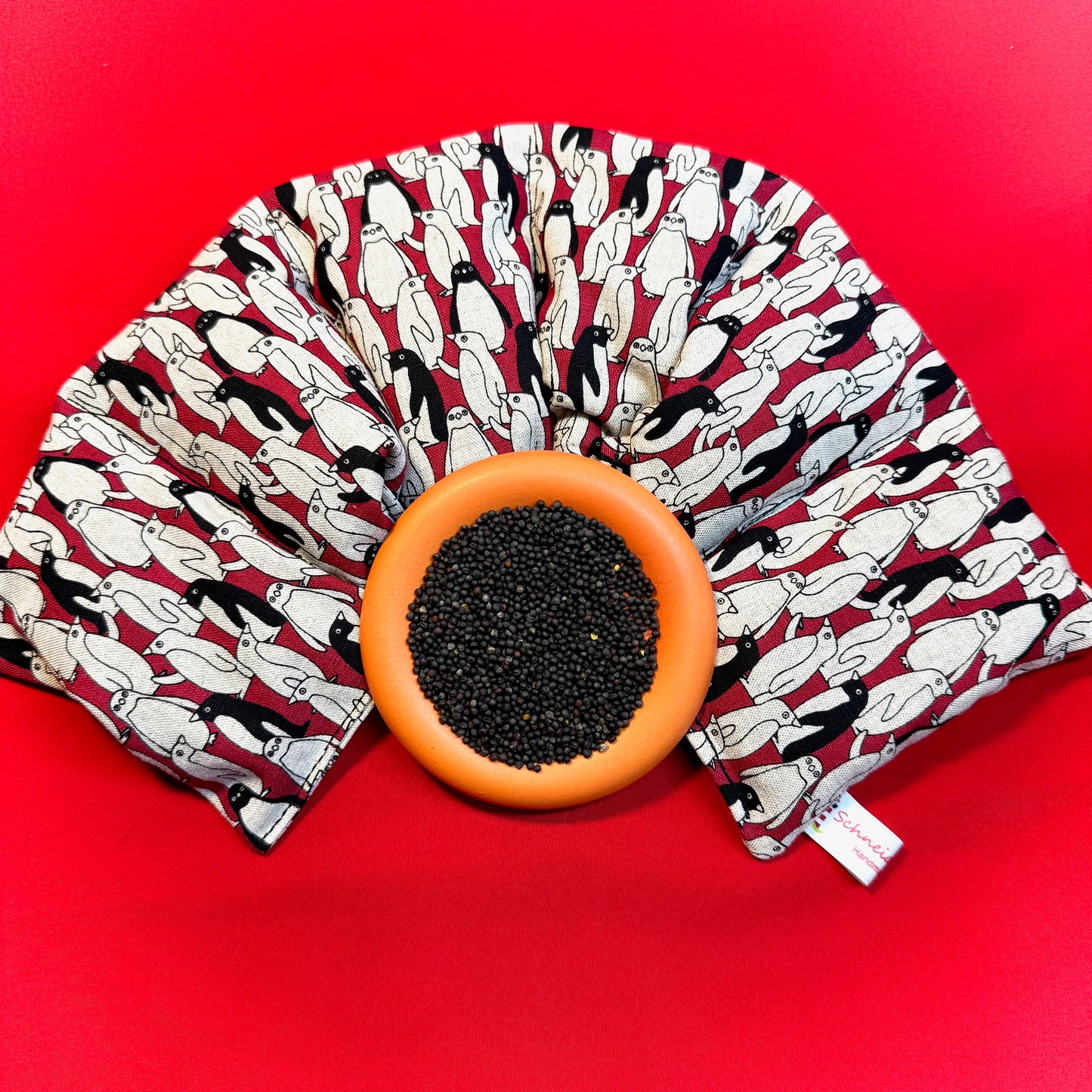 "Wärmender Willi " mit Rapssamen - Einzelstück Pinguine